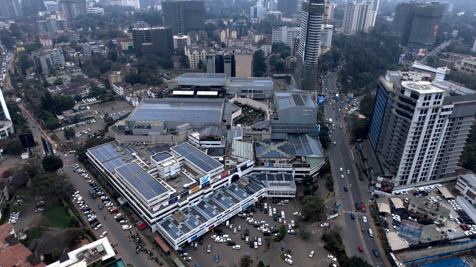 Wide aerial view of Sarit Centre in Westlands with rooftop solar panels on its connected buildings